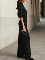 Valentina | Conjunto negro de tres piezas, compuesto por un top camisola transparente y pantalones de pernera ancha.”